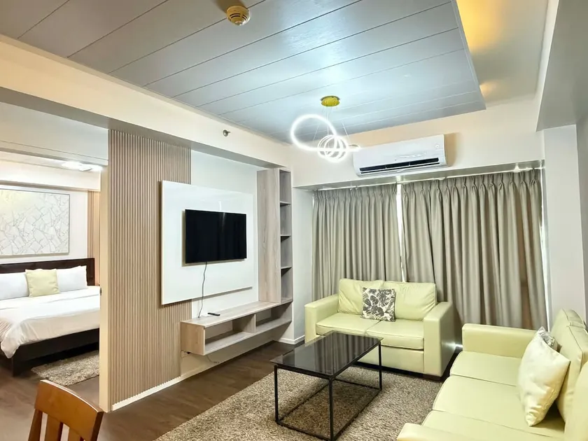 Grand Cenia: A Modern Cozy Home | 2Br near Ayala - Image 1