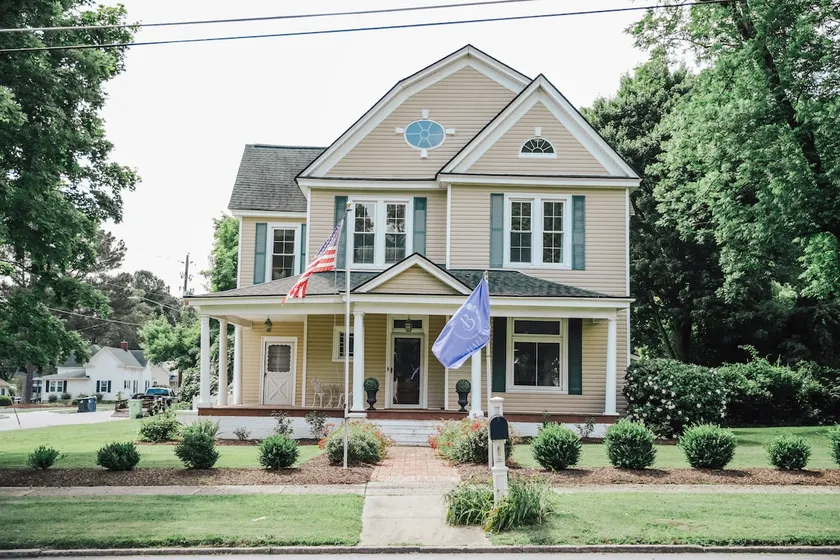 Elegant and revitalized 1912 home with courtyard - Image 1