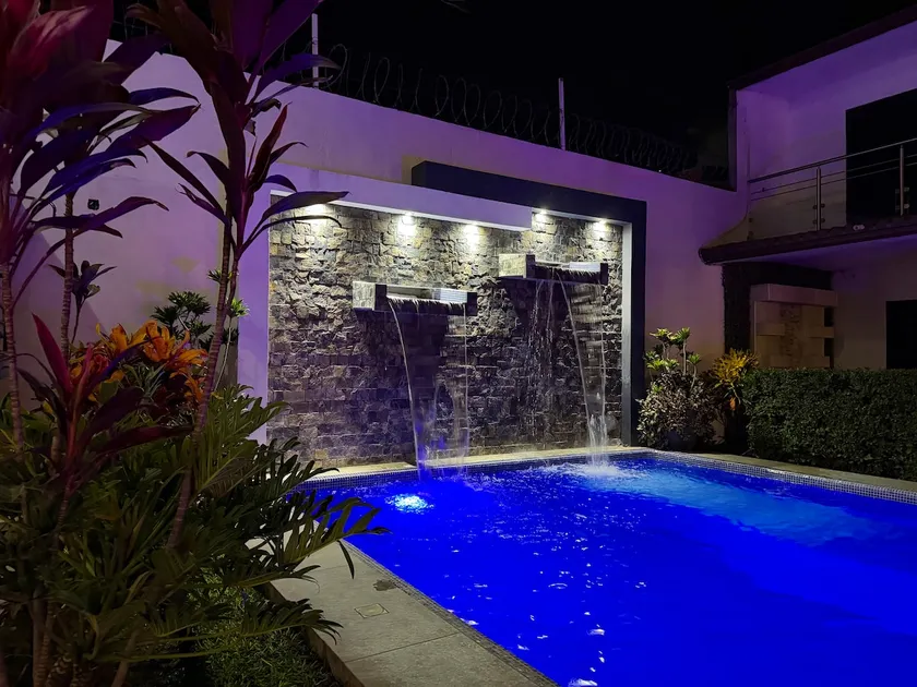 Heated pool with waterfall and barbecue - Image 1
