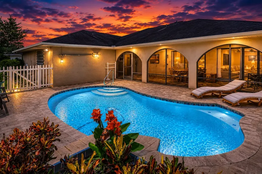 Blissful Waterfront Haven with Heated Pool - Image 1