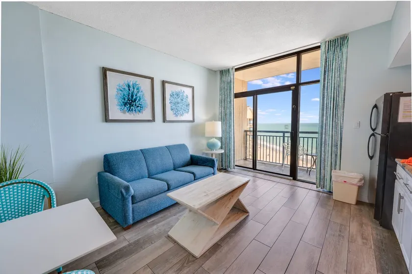 Ocean-view condo w/ balcony & resort access - Image 1