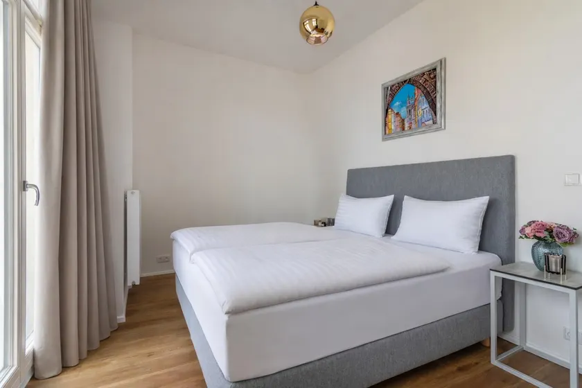 Dwellfort | Luxury Apartment with Balcony and View - Image 1