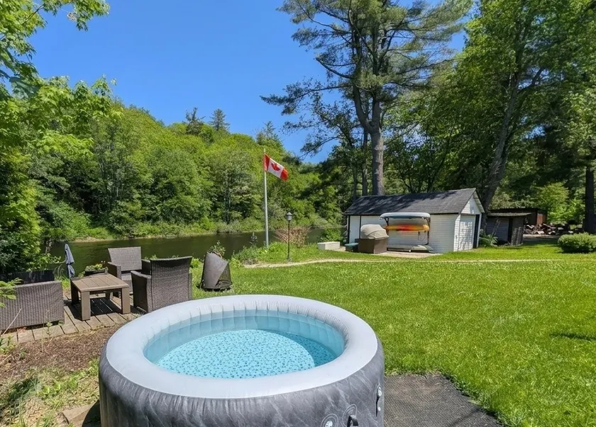 Muskoka Riverfront Retreat w/ Hot Tub & Kayaks - Image 1