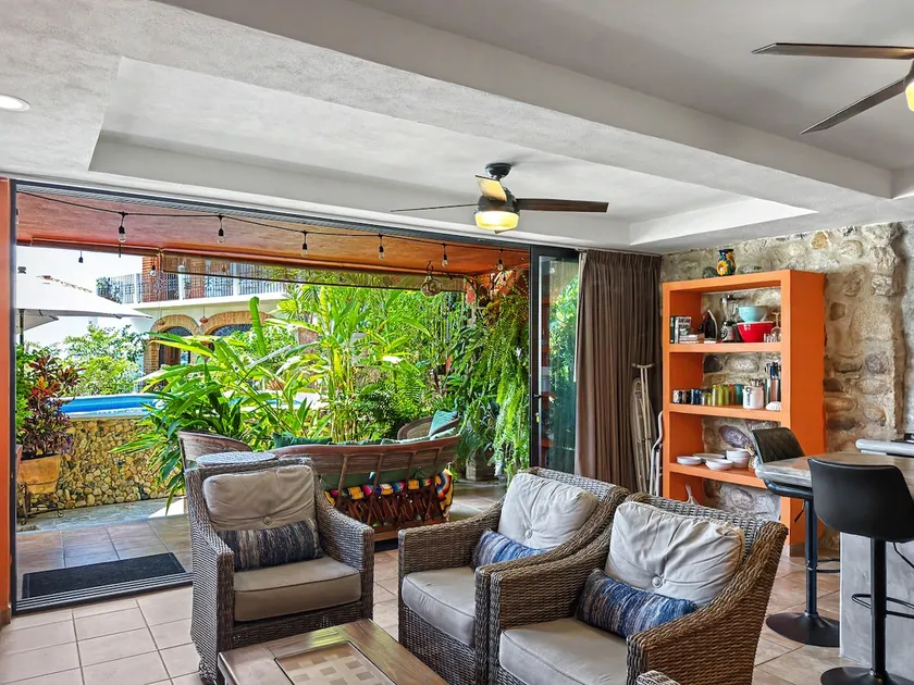 Curiel's Retreat 2BR, Private Terrace, Heated Pool, Walk to Malecón & Beach - Image 1