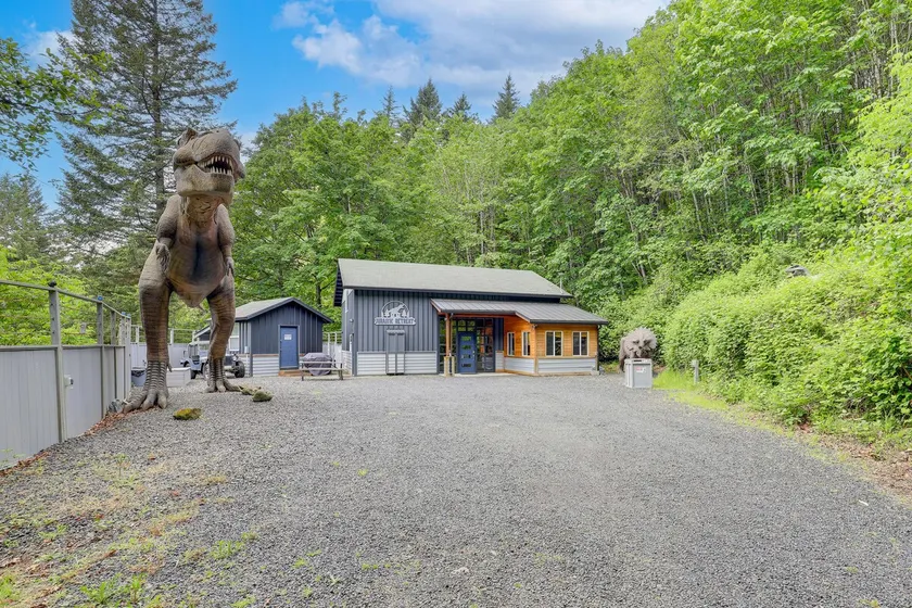 Jurassic Retreat: Hot Tub & Life-Size Dinosaurs! - Image 1