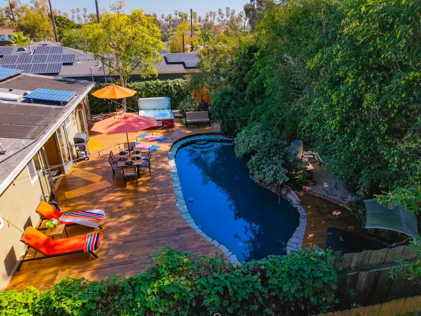 3BR Urban Oasis with Hot Tub, Pool & Private Deck - Image 1