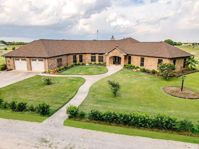 Luxe Farmhouse Nestled on 10 Acre Ranch - Image 1
