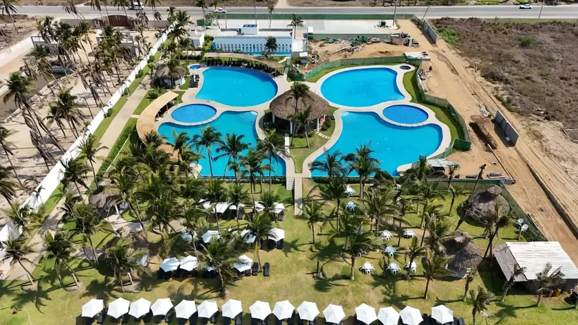 A vacation home with a pool and beach club - Image 1