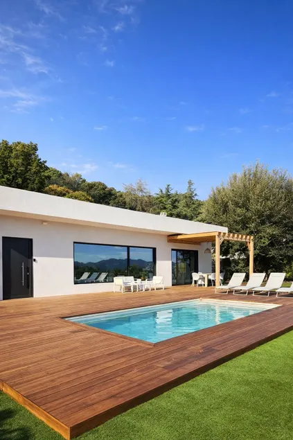 House surrounded by nature with a pool - Image 1