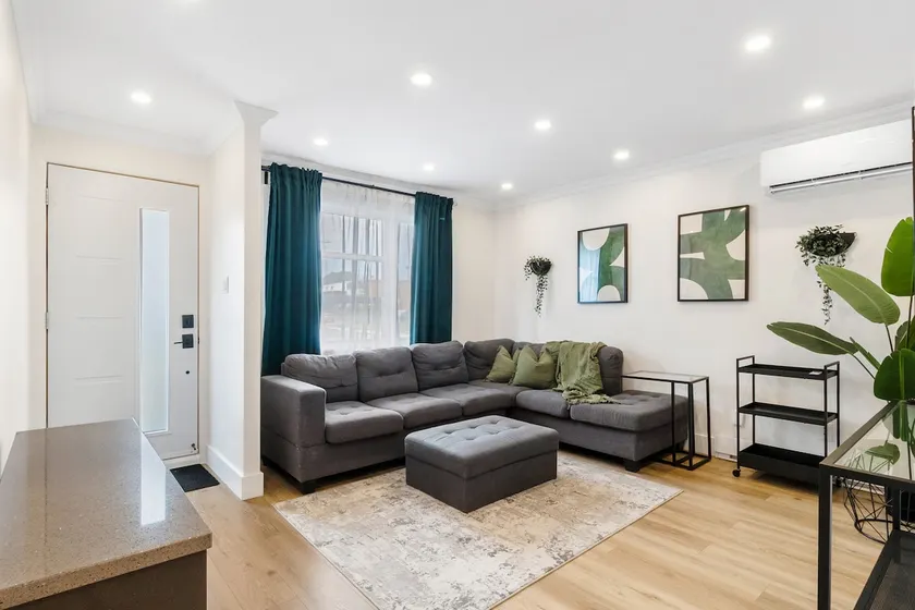 Elegant 3BR Retreat | Laval • King Bed • Parking - Image 1