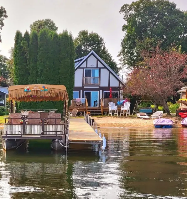 Family Friendly Lakefront Whimsical Cottage with Pontoon Boat in Sister Lakes MI - Image 1