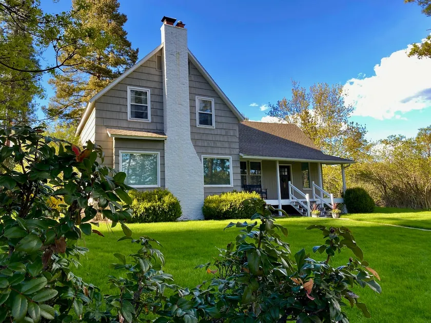 Peaceful Riverside Getaway | Spa, Trails & Views - Image 1