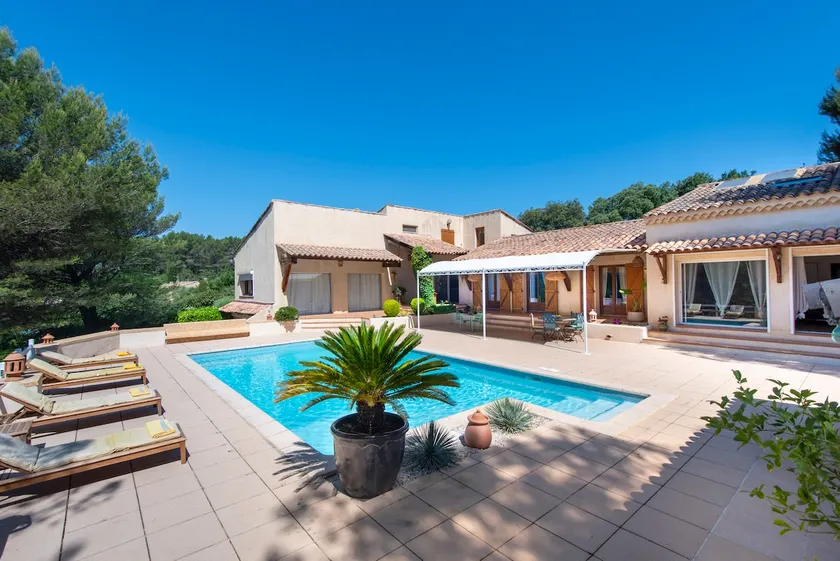 In a quiet, hilly setting, bright residence under the pine trees! - Image 1