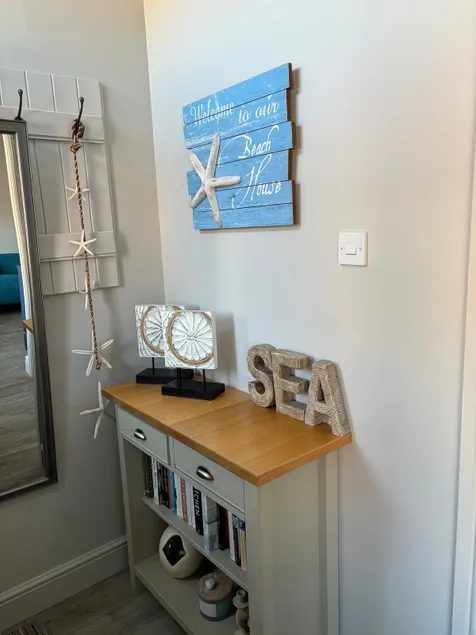 1 bed flat with outside space and moments from sea - Image 1