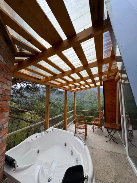 Hill Guesthouse & Cottages - Wine Cellar, Fish Farm & Organic Cuisine - Image 1