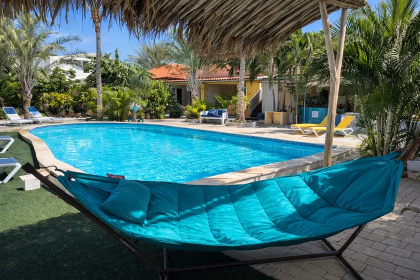 Tropical Garden Escape w/ Pool • Walk to Beach - Image 1