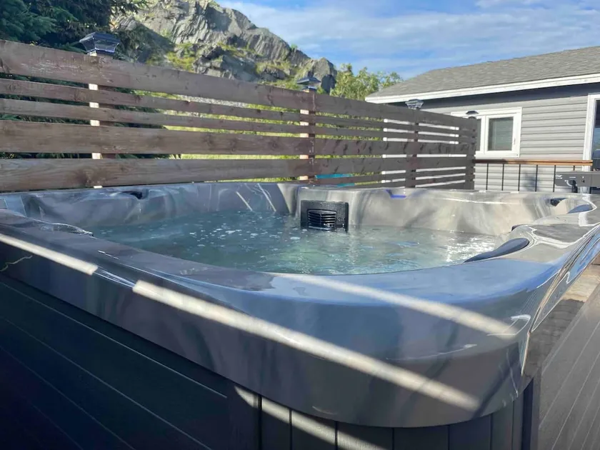 FlatRocks 2BR Stay + Hot Tub & Partial Ocean View - Image 1