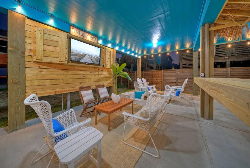 Outdoor Lounge w/ Bar Swing Seats & TV | Blutopia - Image 1