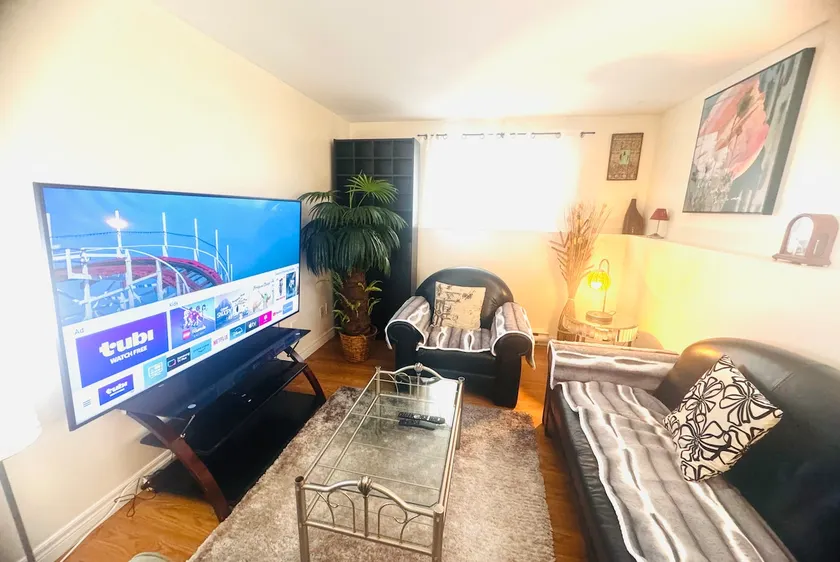 Cozy 1-Bedroom Haven w/ 65 inch TV & Free Parking - Image 1