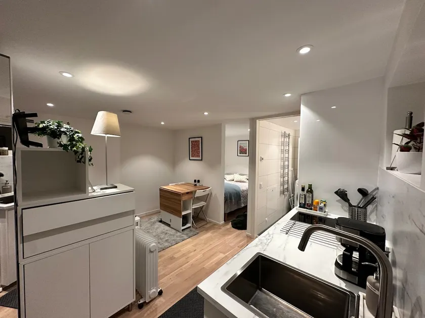 Close to beach and center with patio and parking. - Image 1
