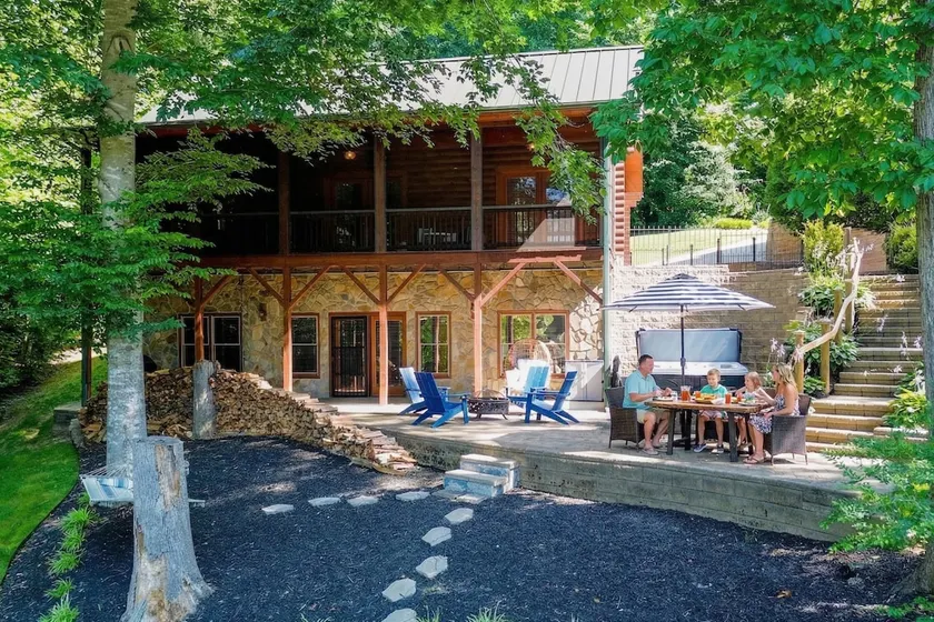 Waterfront Log Cabin w/Hot Tub, Kayaks, Firepit, King Beds, & Pets OK - Image 1