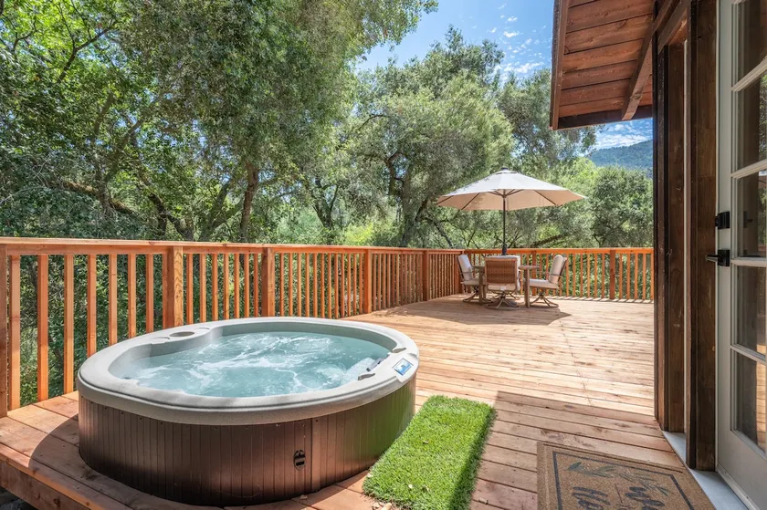 Cabin by the River w/ Private Hot Tub - Image 1