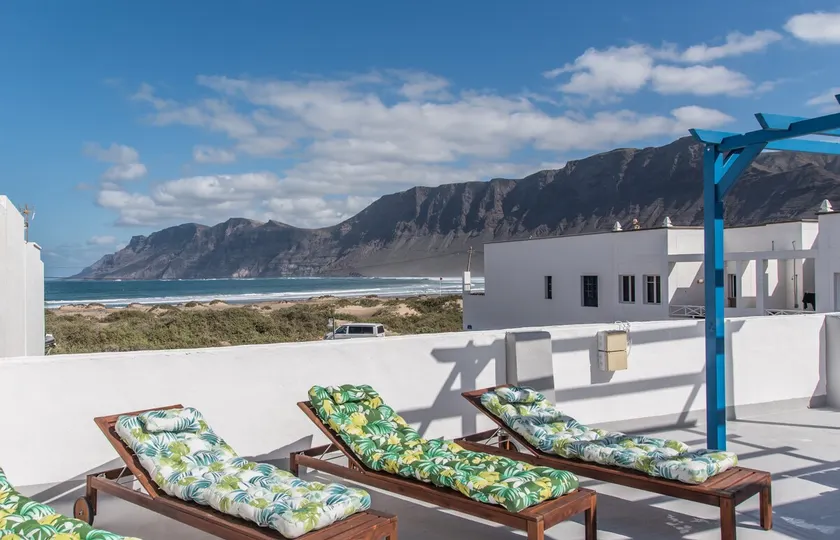 Sandy Bay Home with roof terrace and sea views - Image 1