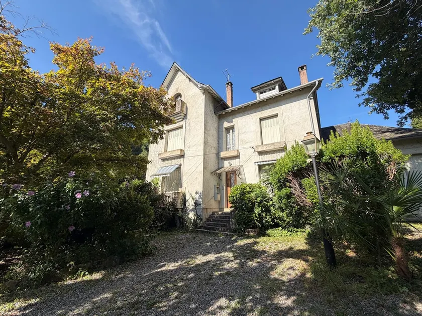 House surrounded by nature - Image 1