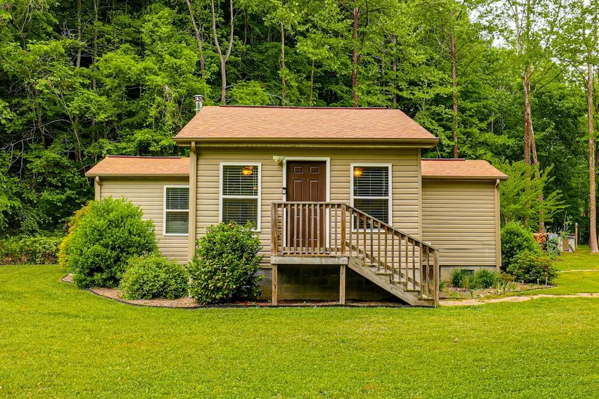Peaceful + Cozy Cottage on Over 7 Acres w/ Creek - Image 1