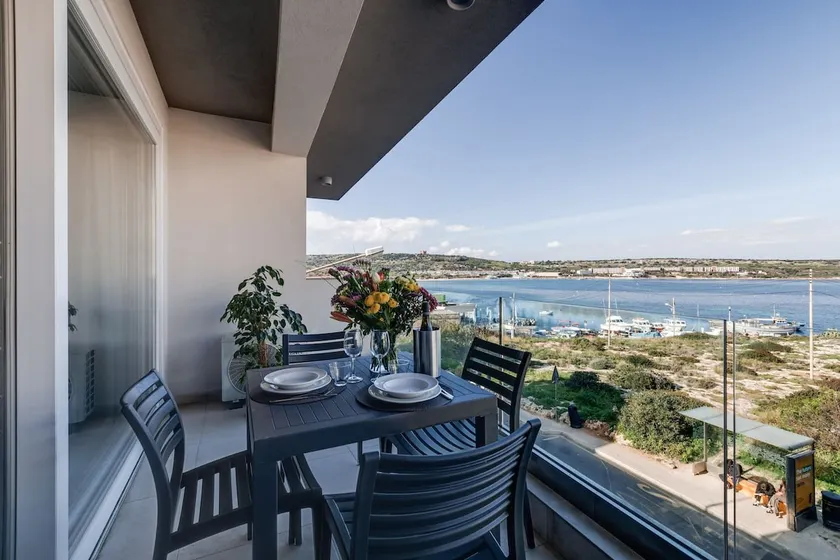 9TEN11 1BED Seaview Mellieha Bay FL 9 by Homely - Image 1