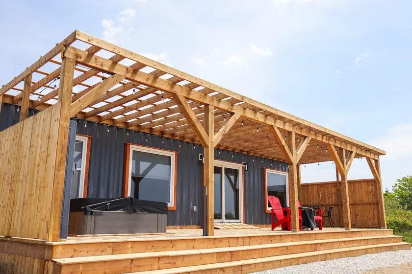 Double wide shipping container cabin with hot tub. - Image 1