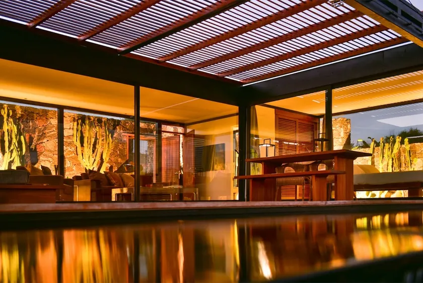 Wake up to nature in this modern glass house - Image 1