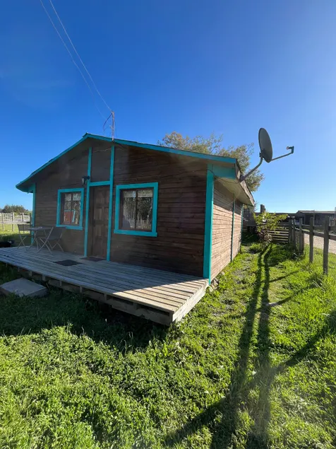 A cabin in front of the forest - Image 1
