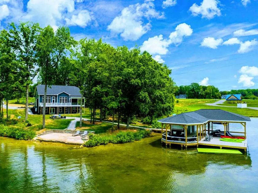 250’ of Lakefront with Boat House & Private Beach - Image 1