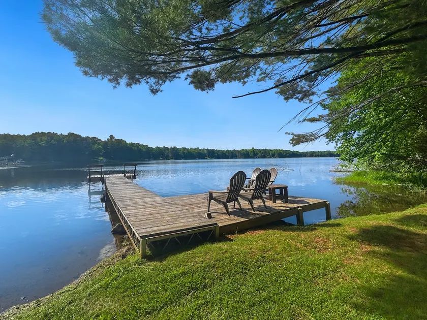 Lakefront 3BR, 2BA cabin with dock, boat, firepit - Image 1