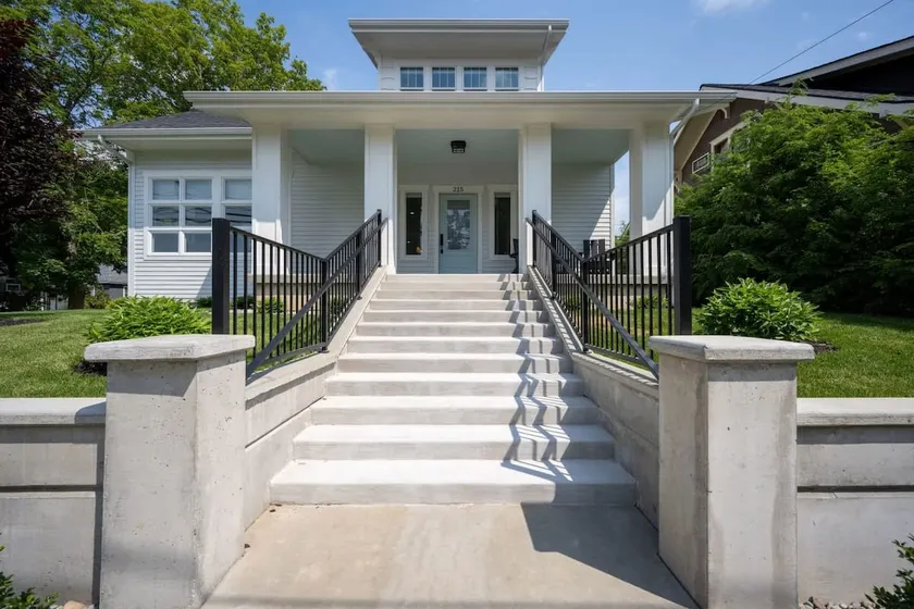 Downtown Dream: 5BR Retreat with Hot Tub & Gym - Image 1