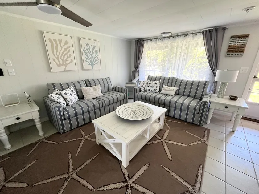 Poolside studio home! A walk to the beach! - Image 1