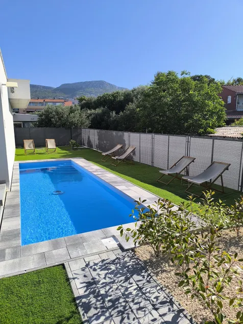 Maslina House - Family apartment 1 with Pool - Image 1