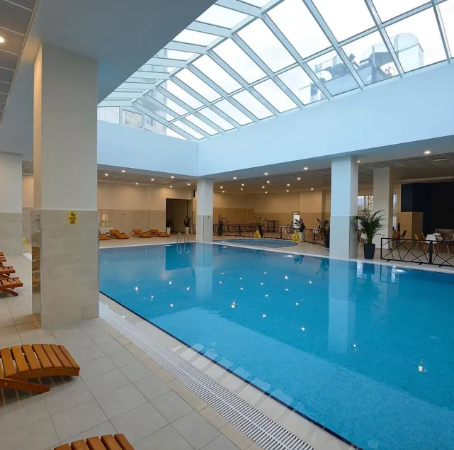 Apartment mit Whirlpool, Pool und Sauna | Stadtblick - Image 1
