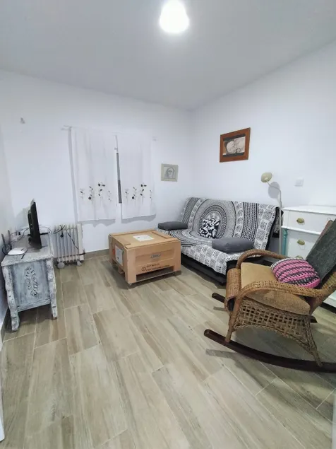 Apartamentos de Dora, House with a double bed and a sofa. - Image 1