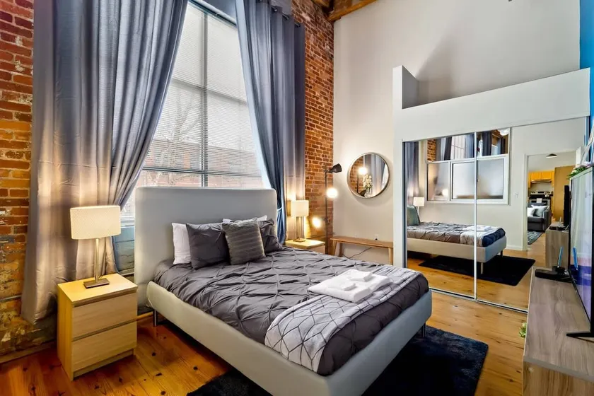 100 Year-Old Historic Brick 2BR Loft & Large Patio & Hammocks & High Ceiling - Image 1