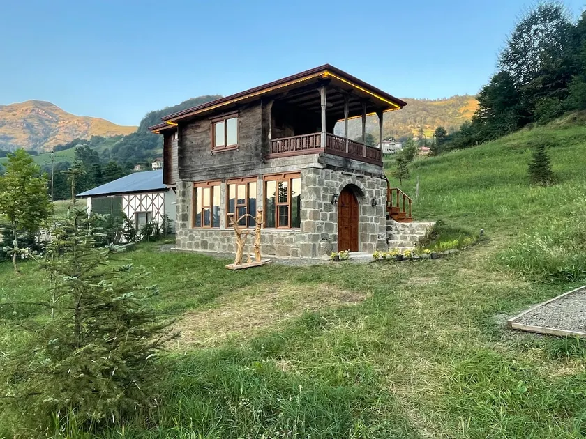 Stone & Wood House in Nature (Nero House) - Image 1
