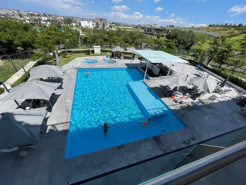 Apartment with a pool, spa, and lake - Image 1