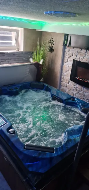 Private Jacuzzi & Sauna Suite - Image 1