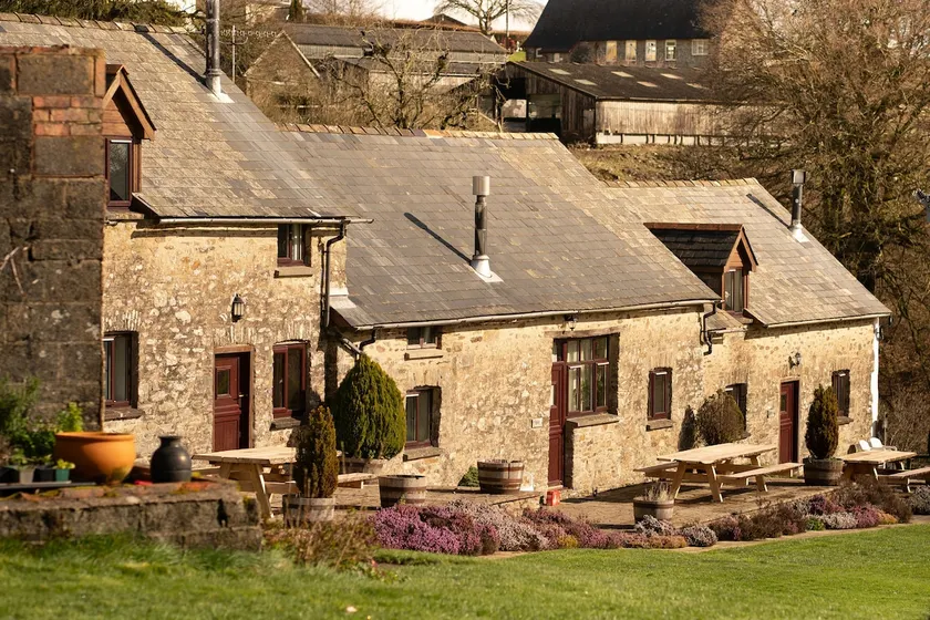 Two adjoining cottages with a shared patio - Image 1