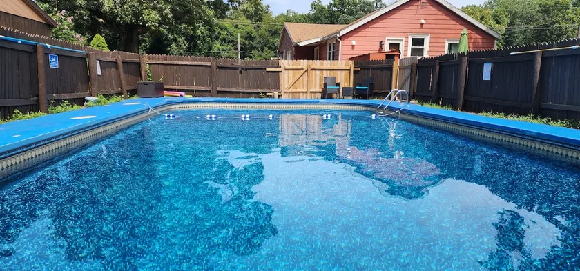 Home near the lake with an inground pool - Image 1