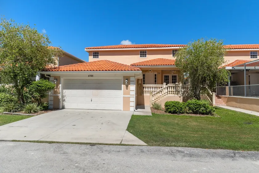 4 BR, 3.5 BA Waterfront Villa at TradeWinds 105 - Image 1
