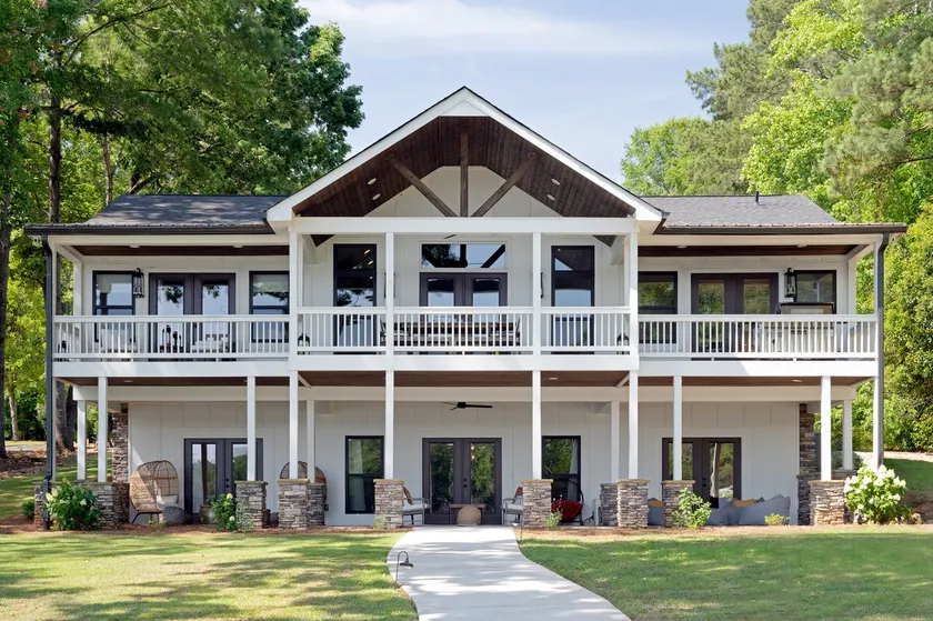 Lakefront Sleeps 12 | Dock, Swim Spa, Golf Sim, Gym, Arcade - Image 1