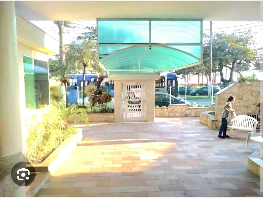 Building in front of the beach. - Image 1