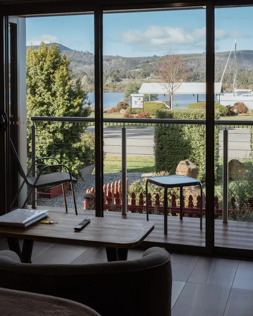 Huon Honeymoon Suite · Boat Reflections - Image 1